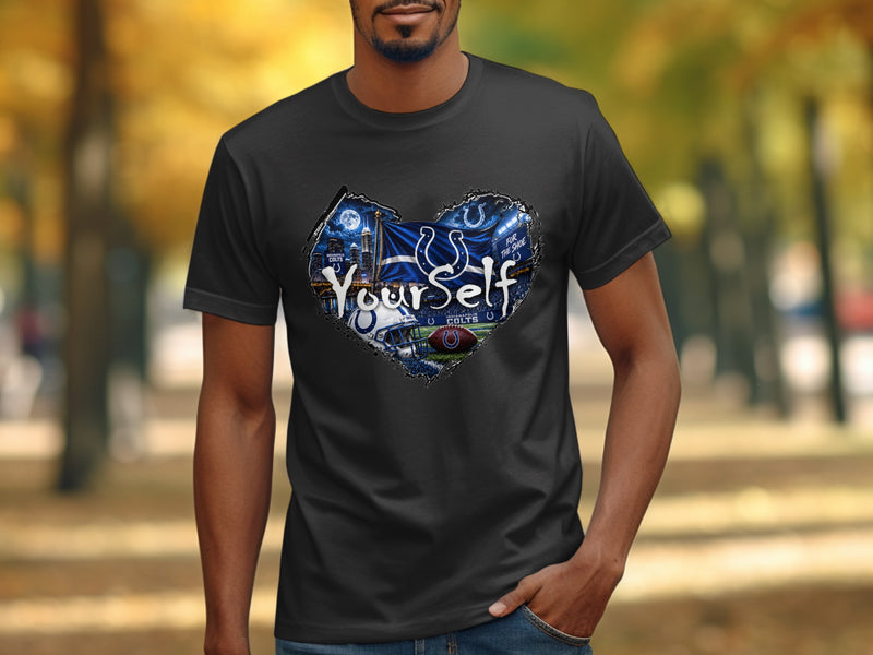 Load image into Gallery viewer, Indianapolis Colts graphic t-shirt with football helmet, ball, and cityscape.
