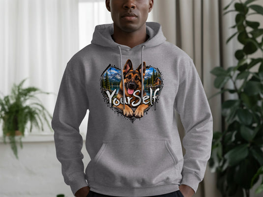 Grey hoodie with a heart-shaped graphic featuring a German Shepherd and a mountain landscape.