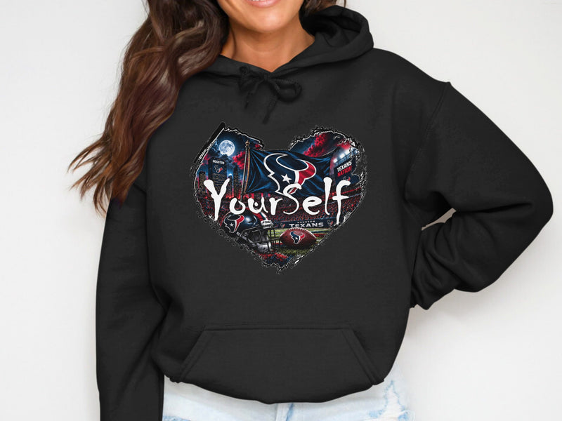 Load image into Gallery viewer, Black hoodie with Houston Texans football heart graphic and "Yourself" text.
