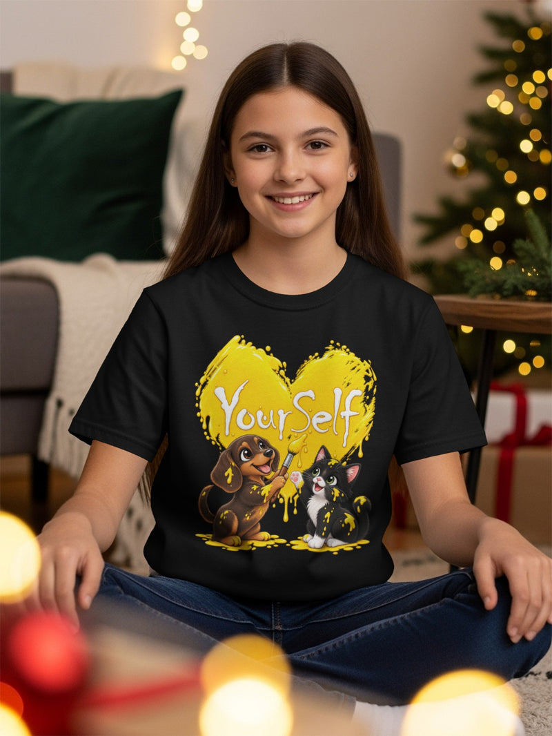 Load image into Gallery viewer, Black t-shirt with a dog painting a cat yellow inside a heart, saying "Your Self".
