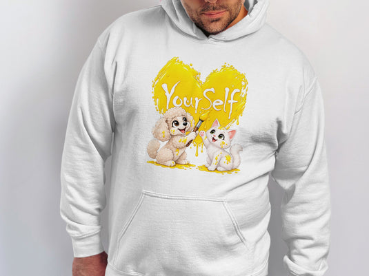 White hoodie with a yellow heart graphic featuring a dog and cat painting.