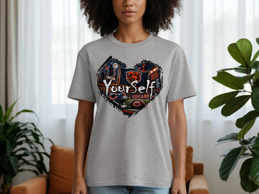 Grey t-shirt with a heart shape graphic featuring Chicago skyline, Bears logo, and football elements.