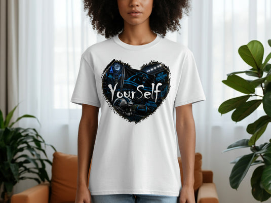 White t-shirt featuring a heart graphic with Carolina Panthers logo and football imagery.