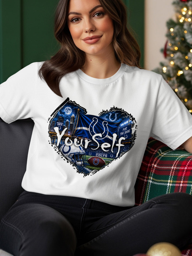Load image into Gallery viewer, White t-shirt with Indianapolis Colts heart graphic featuring football, helmet, and stadium.

