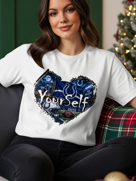White t-shirt with Indianapolis Colts heart graphic featuring football, helmet, and stadium.