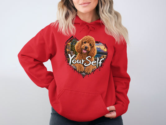 Red hoodie with heart graphic of a poodle, cabin, and mountains.