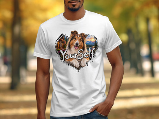 White t-shirt with a heart-shaped graphic featuring a dog and mountain scenery, with text.