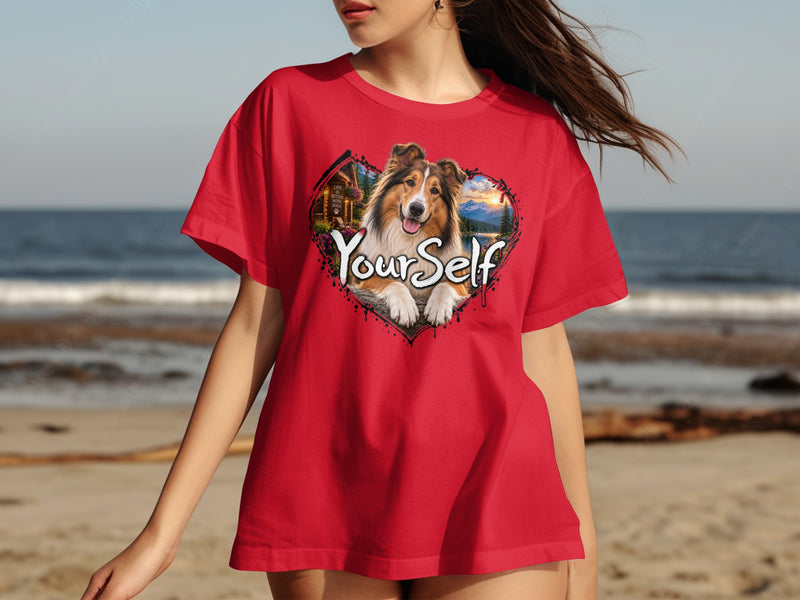 Load image into Gallery viewer, Red t-shirt with heart graphic featuring a dog, cabin, mountains, and text "YourSelf".
