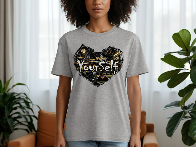 Load image into Gallery viewer, Grey t-shirt featuring a heart-shaped graphic with New Orleans Saints imagery and text.
