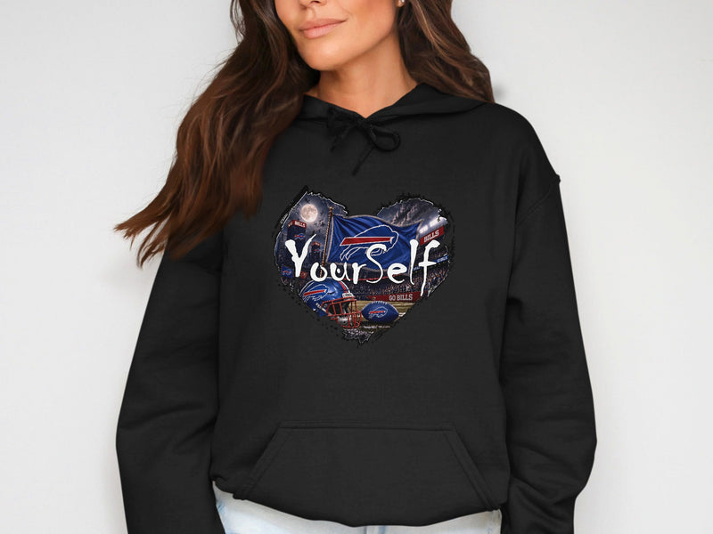 Load image into Gallery viewer, Black hoodie with a heart graphic featuring Buffalo Bills football elements and "Yourself".
