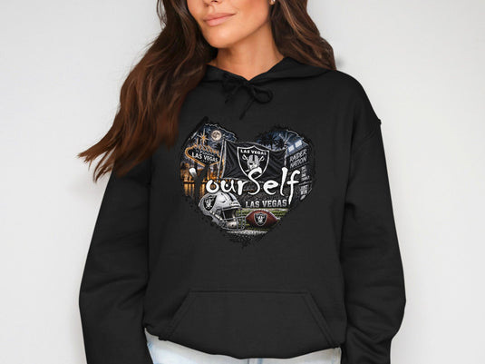 Black hoodie with a heart-shaped graphic featuring Las Vegas Raiders imagery and text.