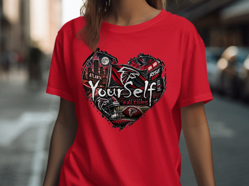 Load image into Gallery viewer, Red t-shirt with a heart-shaped graphic featuring Atlanta Falcons football elements.
