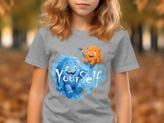 Grey t-shirt with blue and orange monsters and "Your Self" text.