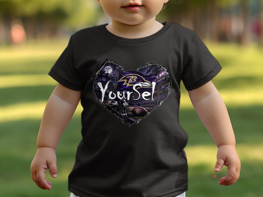 Black t-shirt featuring Baltimore Ravens logo, stadium, and football, with text 