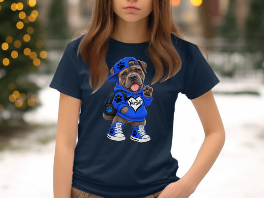 Dog wearing blue hoodie, hat, and sneakers with 