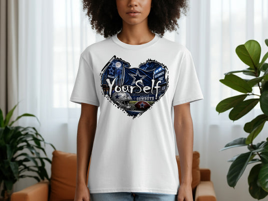 White t-shirt with a heart graphic featuring Dallas Cowboys imagery and text.