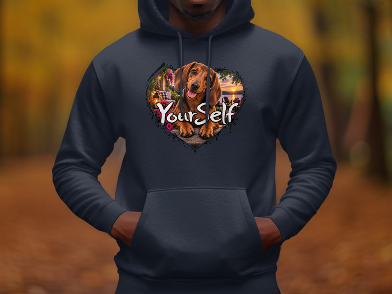 Load image into Gallery viewer, Dachshund in heart frame with text "YourSelf" on dark blue hoodie.
