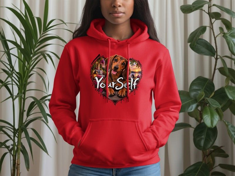 Load image into Gallery viewer, Red hoodie with a dachshund graphic and the text "YourSelf" inside a heart.
