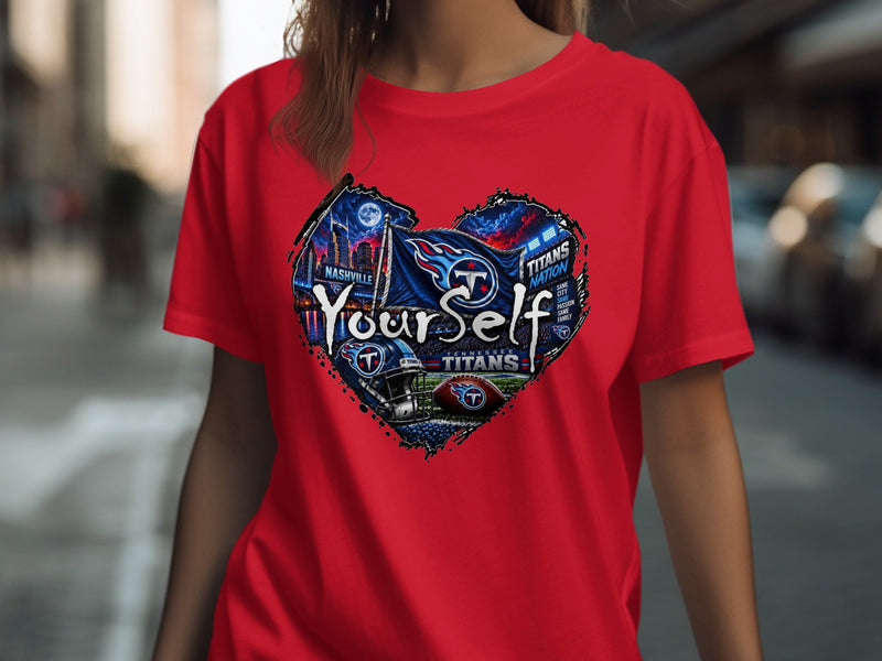 Load image into Gallery viewer, Red t-shirt with Tennessee Titans heart graphic featuring Nashville skyline and football imagery.
