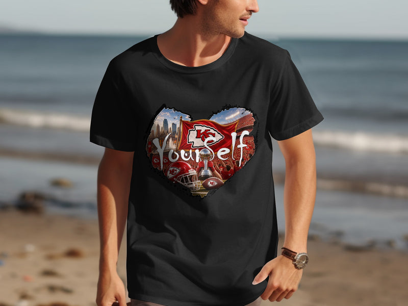 Load image into Gallery viewer, Black t-shirt featuring a heart-shaped graphic of Kansas City Chiefs memorabilia and stadium.
