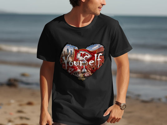 Black t-shirt featuring a heart-shaped graphic of Kansas City Chiefs memorabilia and stadium.