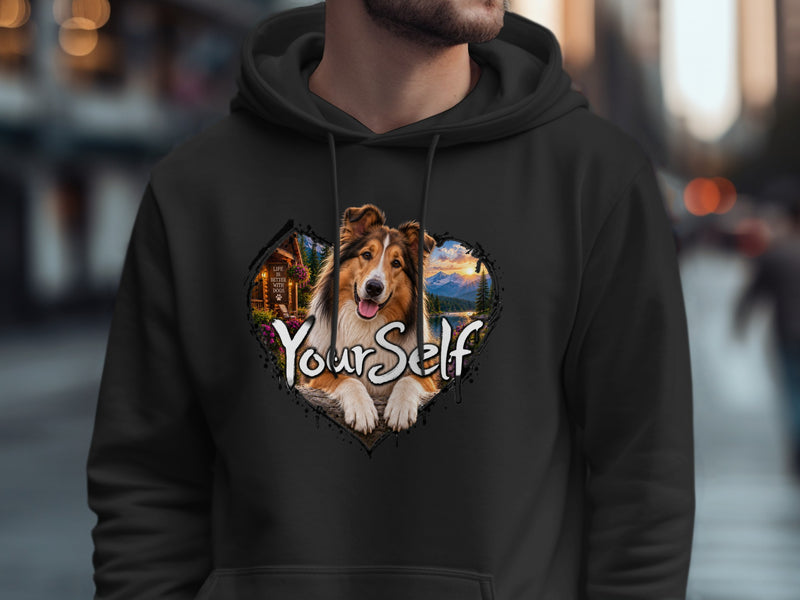 Load image into Gallery viewer, Black hoodie featuring a heart design with a dog, cabin, and mountains. Text says "Your Self".
