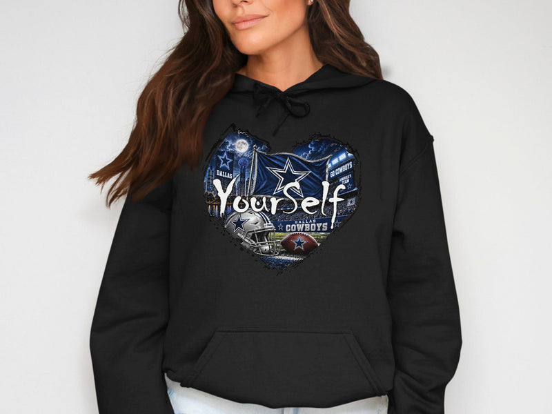 Load image into Gallery viewer, Dallas Cowboys heart graphic with football, helmet, flag, and stadium on black hoodie.
