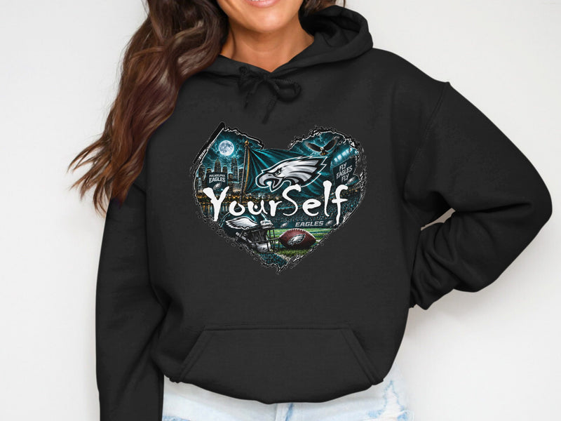 Load image into Gallery viewer, Philadelphia Eagles heart graphic with text "YourSelf" on a black hoodie.
