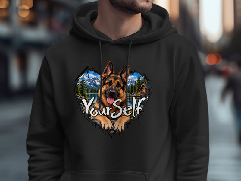 Load image into Gallery viewer, Black hoodie featuring a German Shepherd's head and paws within a heart-shaped mountain landscape, text "Your Self".
