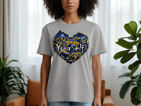 Los Angeles Rams heart graphic t-shirt featuring city skyline, football, and text.