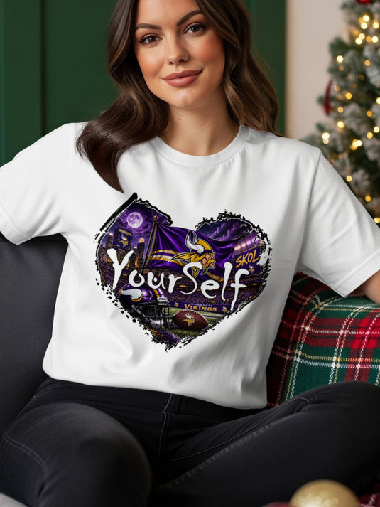 White t-shirt with Minnesota Vikings graphic of stadium and text "Yourself Skol".